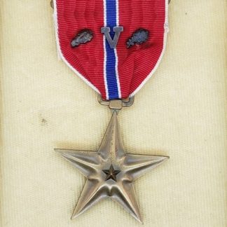 WWII US Bronze Star with Valor Device in Coffin Box